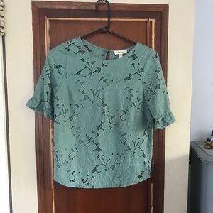 Muted green floral blouse